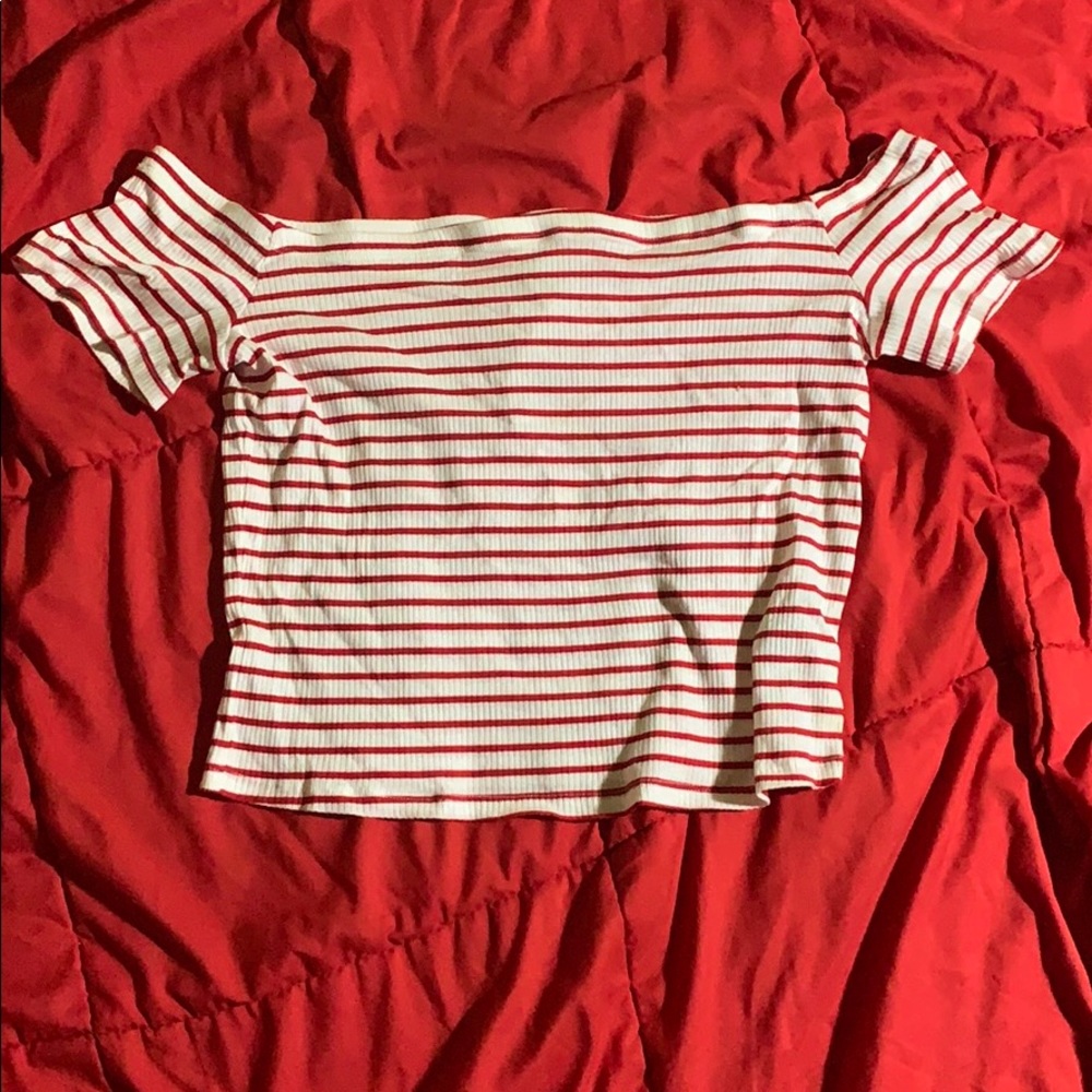 Striped red and white shirt.